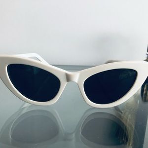 YSL white cat eye sunglasses.Beautiful,stylish.No scratches.